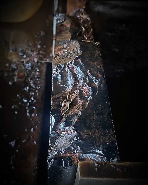 Working it into sheets — The slab is processed down into flat, even sheets of obsidian.